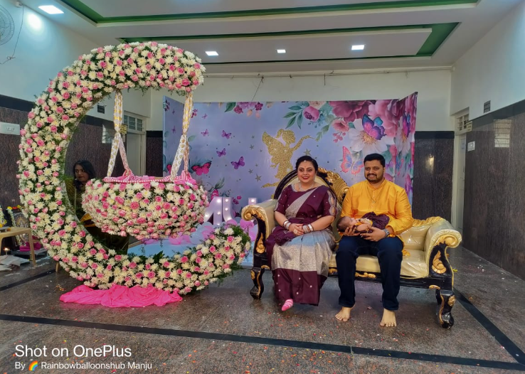 Welcome Baby decoration with balloons and backdrop